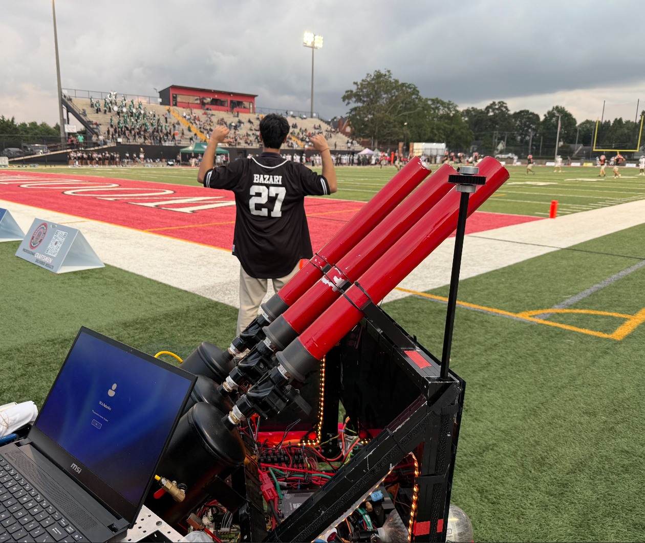 School T-shirt cannon beside the football field